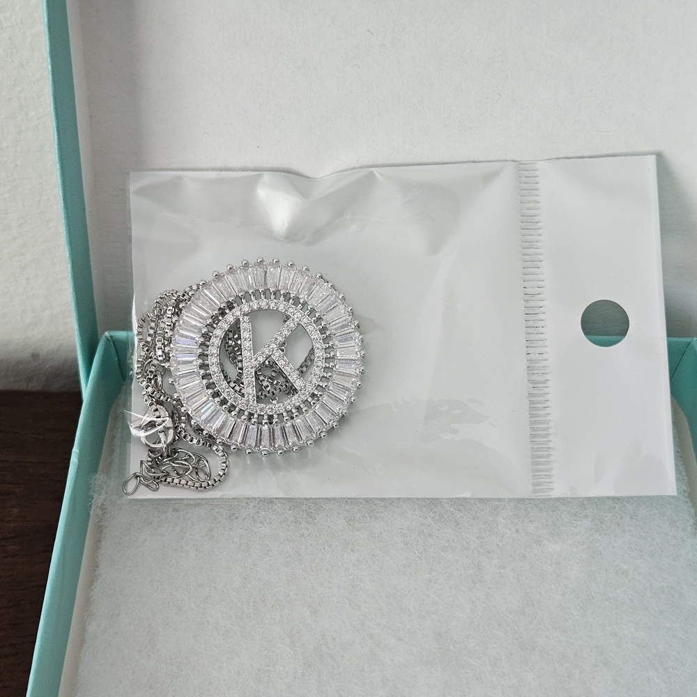 K. Elegant Silver Pendant Necklace